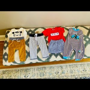 Bundle of baby boy spring/summer clothes.